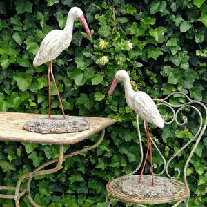 2 cast stone storks