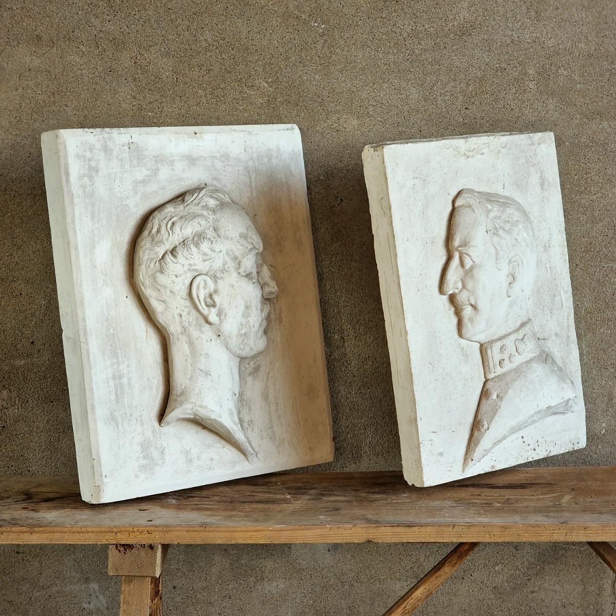 2 plaster bas-relief panels