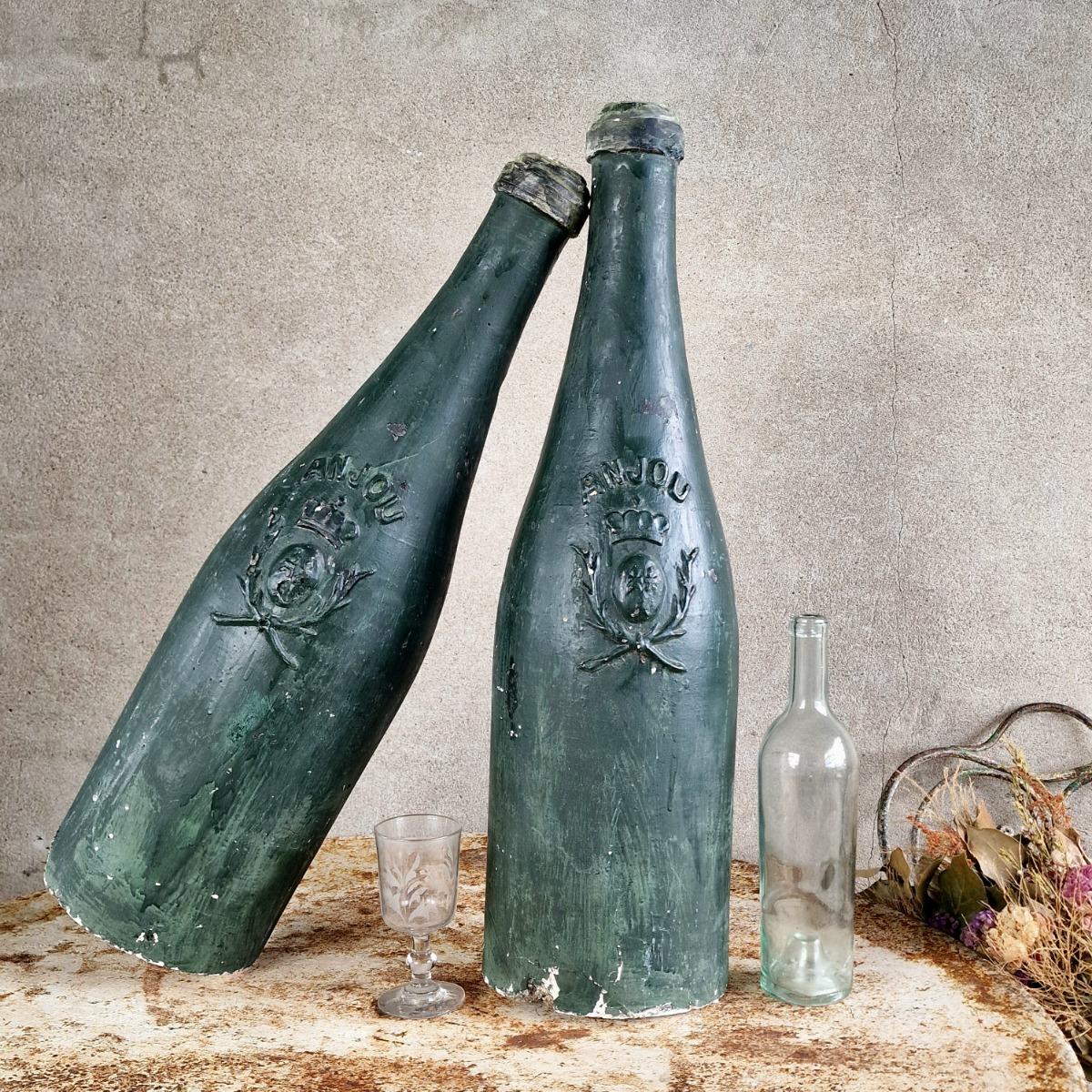 2 XL plaster wine bottles