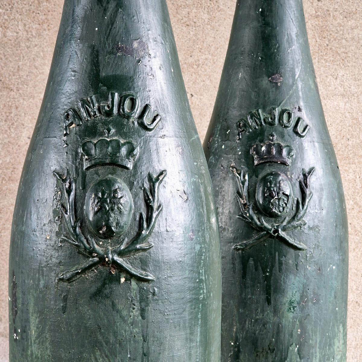 2 XL plaster wine bottles