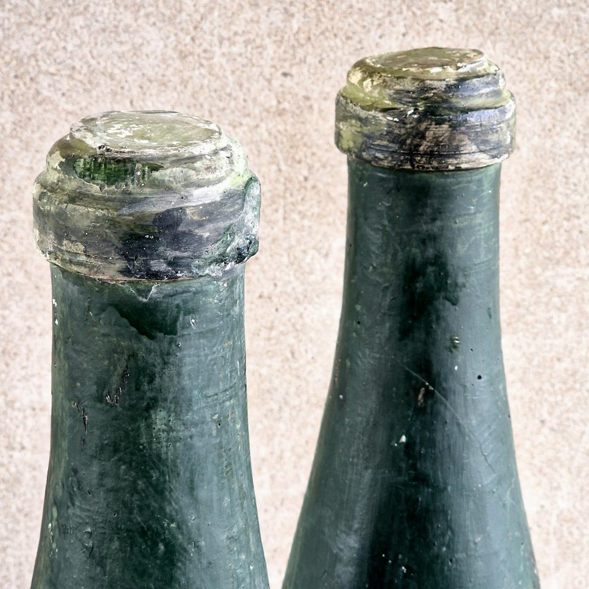 2 XL plaster wine bottles