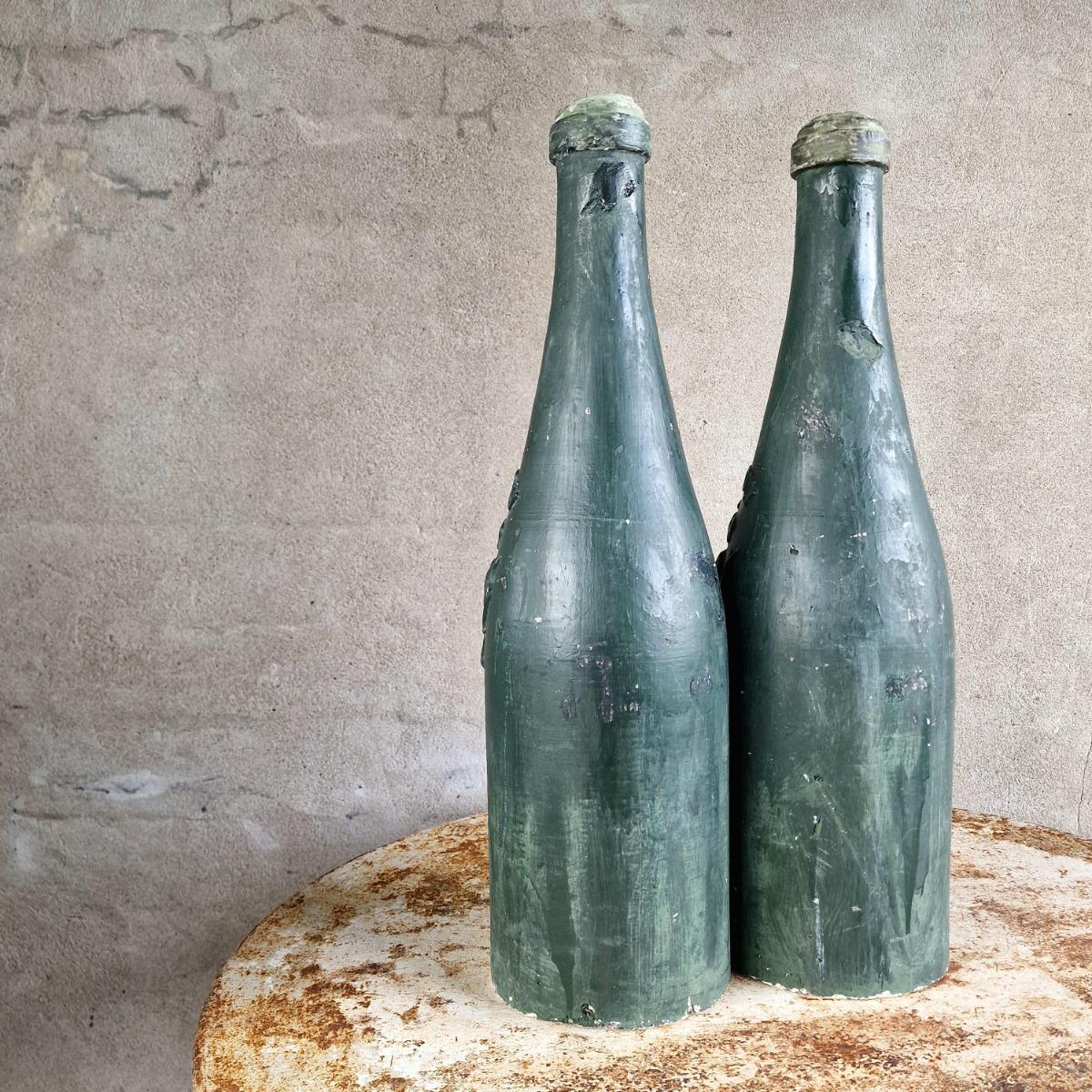 2 XL plaster wine bottles
