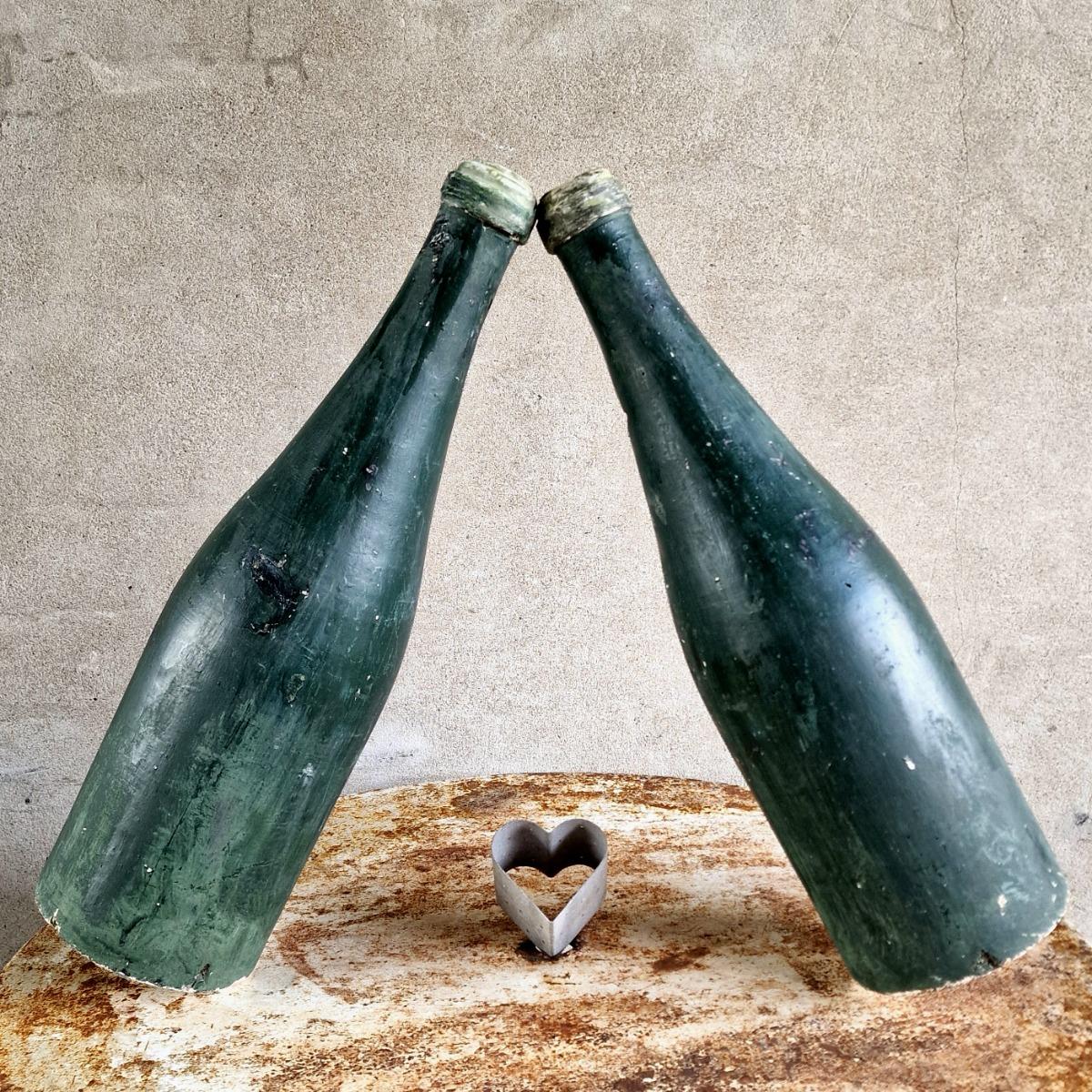 2 XL plaster wine bottles