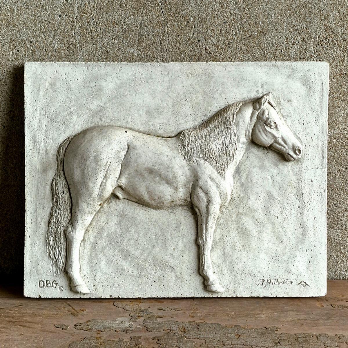 4 cast stone animal tiles