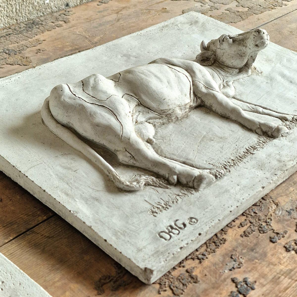 4 cast stone animal tiles