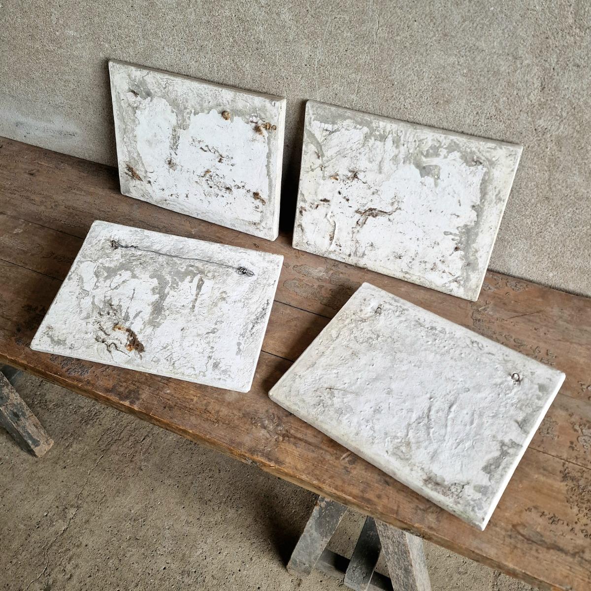 4 cast stone animal tiles