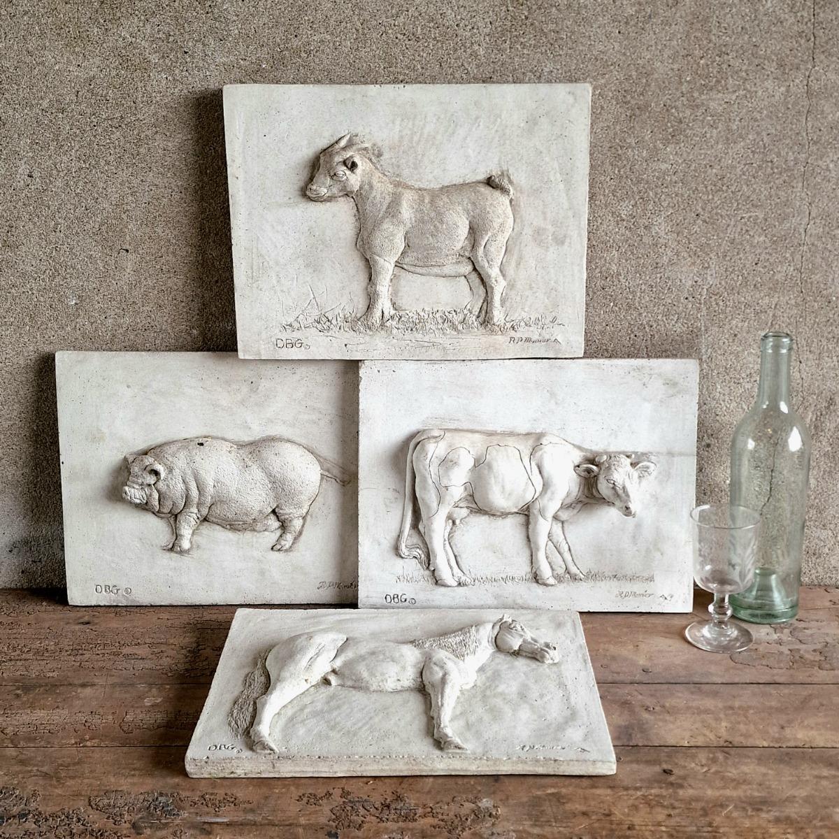 4 cast stone animal tiles