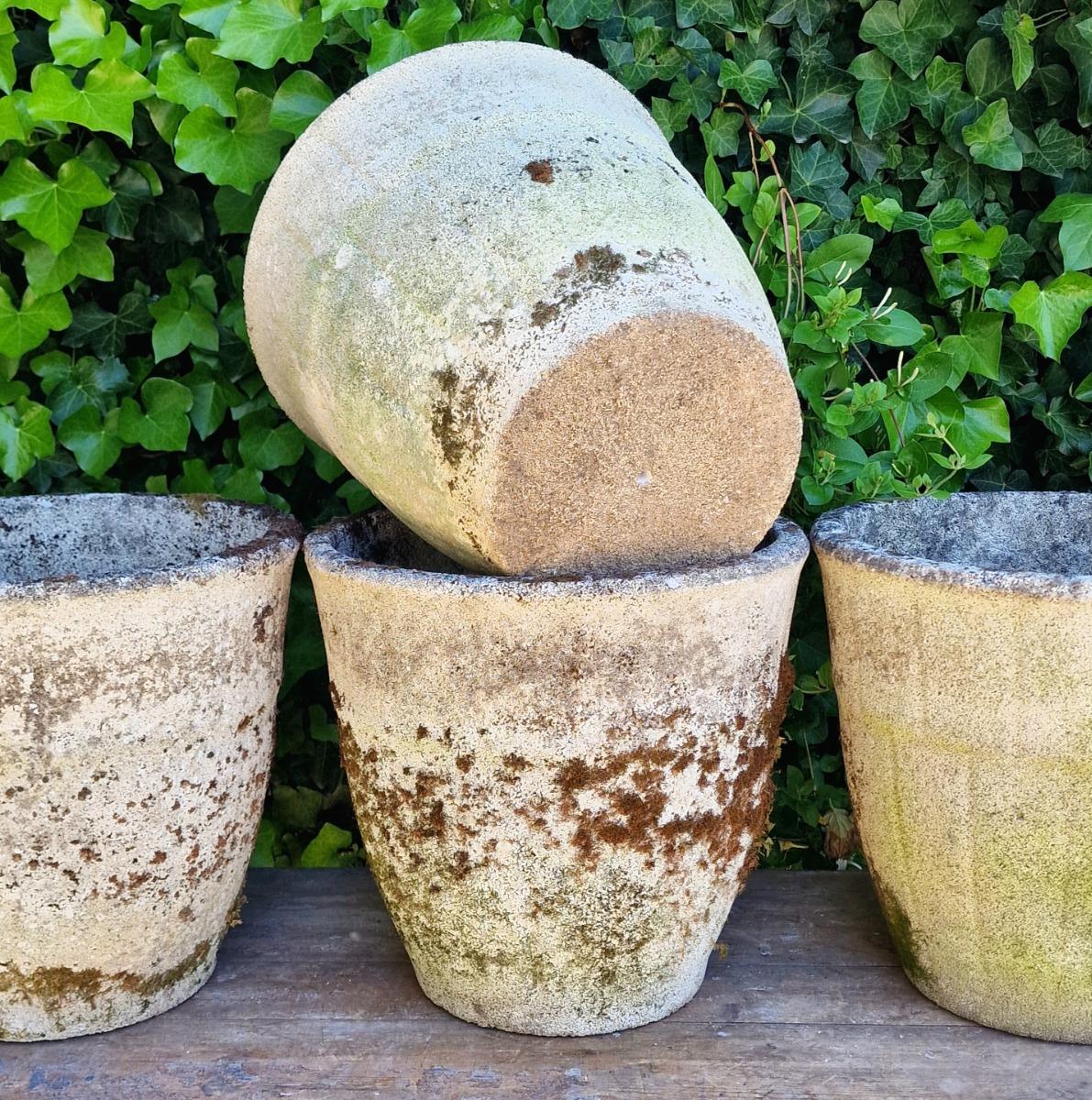 4 weathered round planters