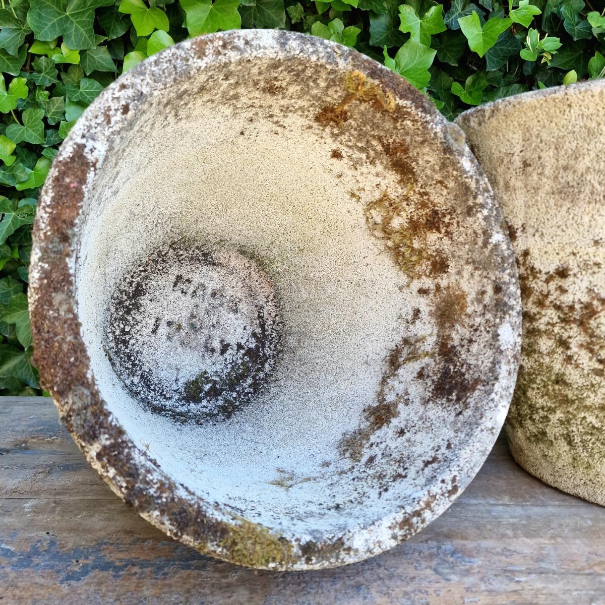 4 weathered round planters