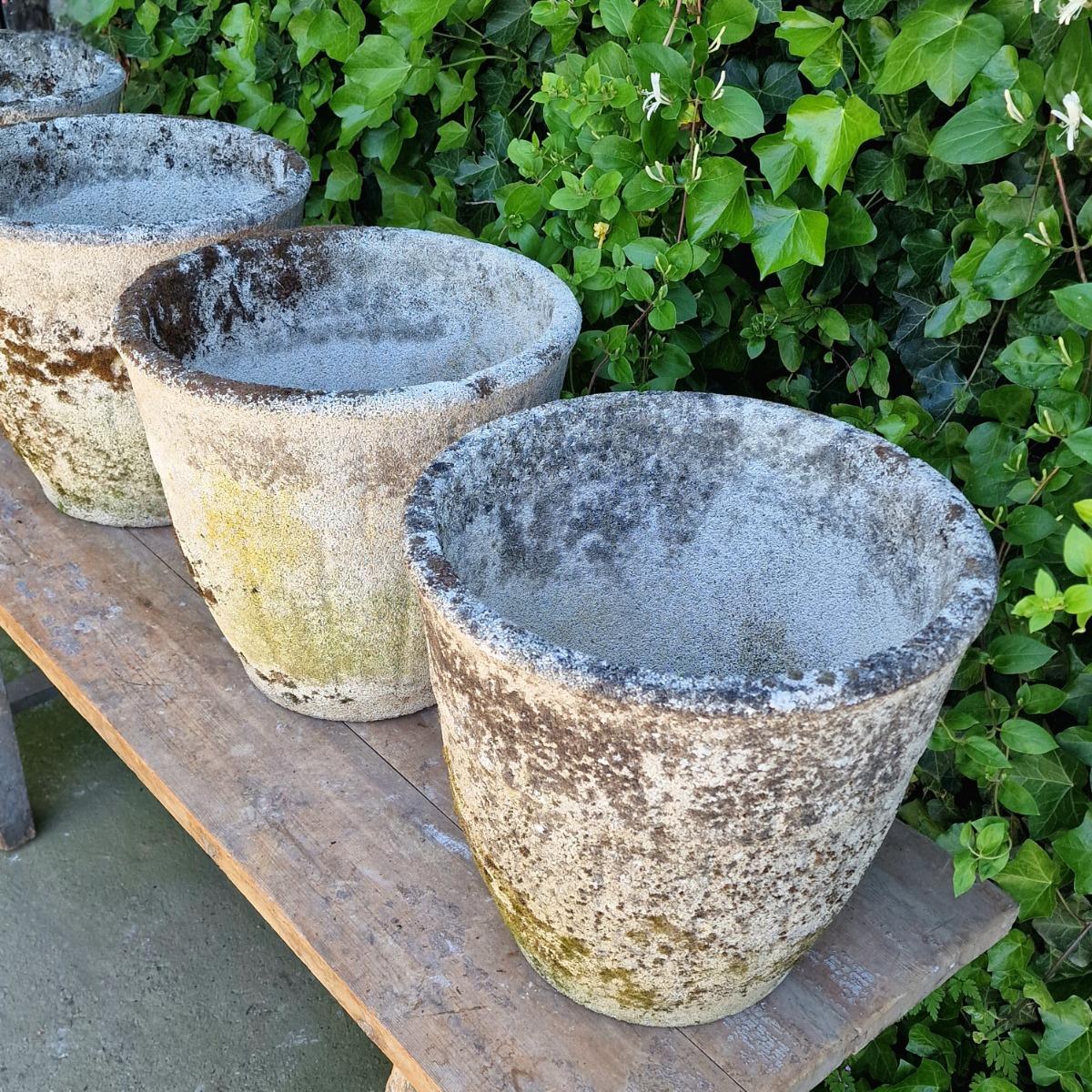 4 weathered round planters