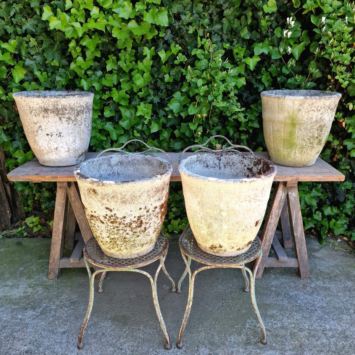 4 weathered round planters