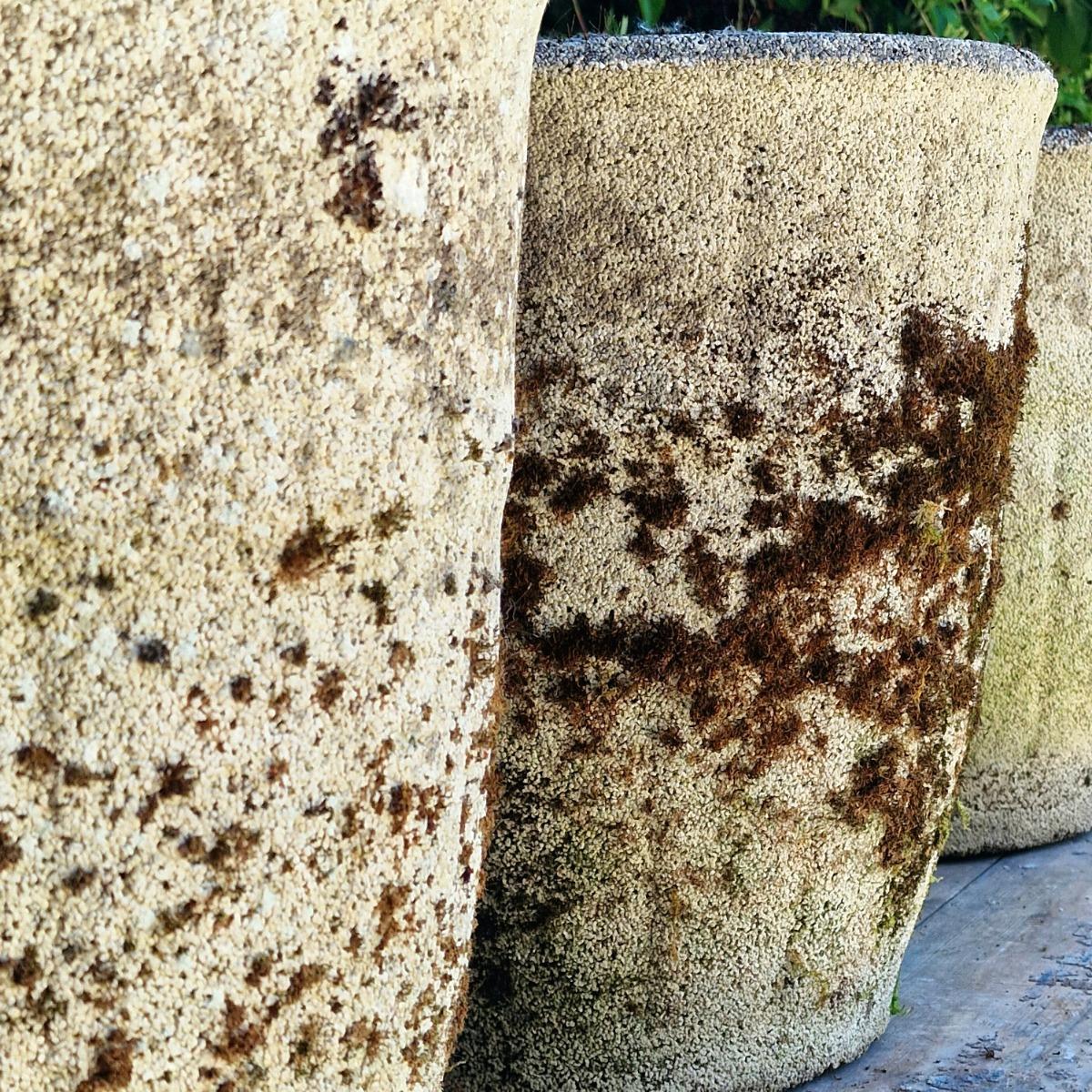 4 weathered round planters