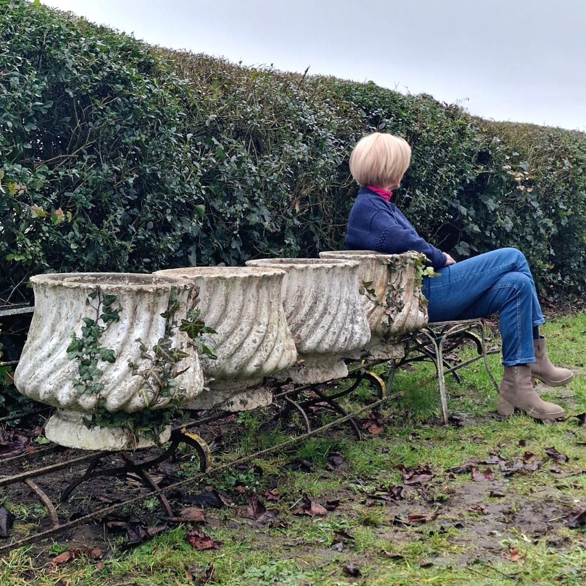 4 white cast stone planters