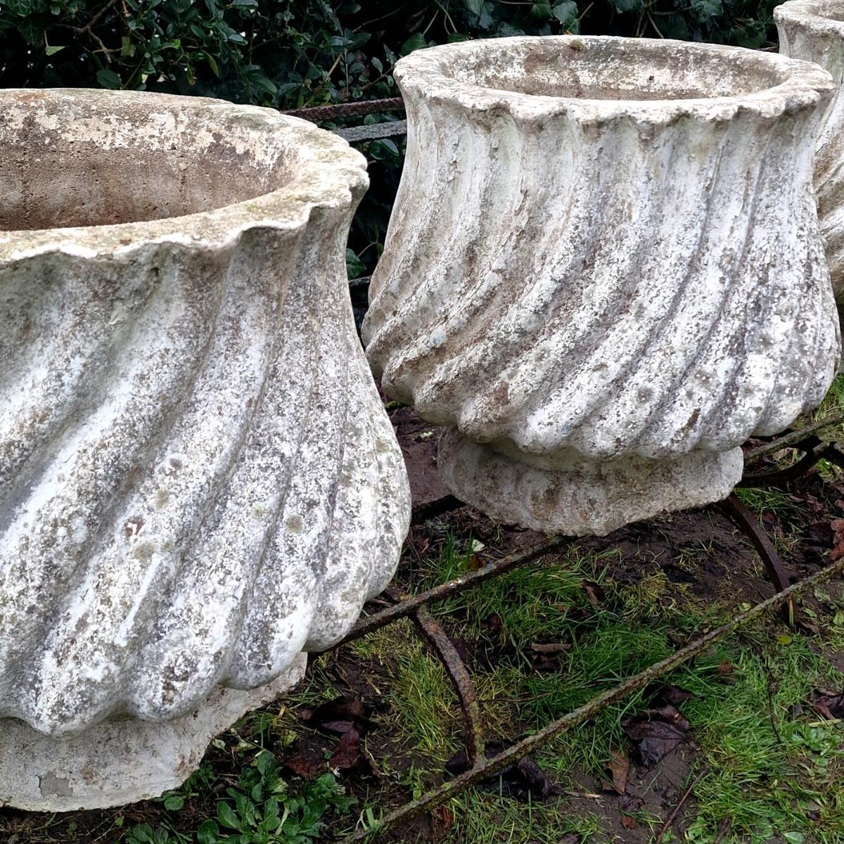 4 white cast stone planters