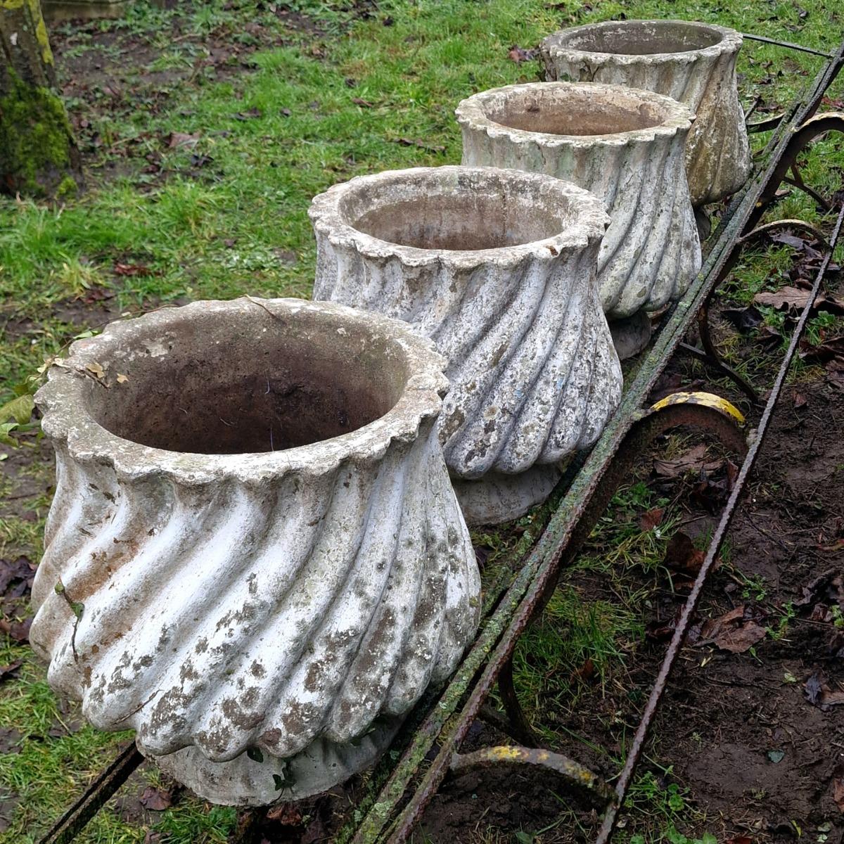4 white cast stone planters