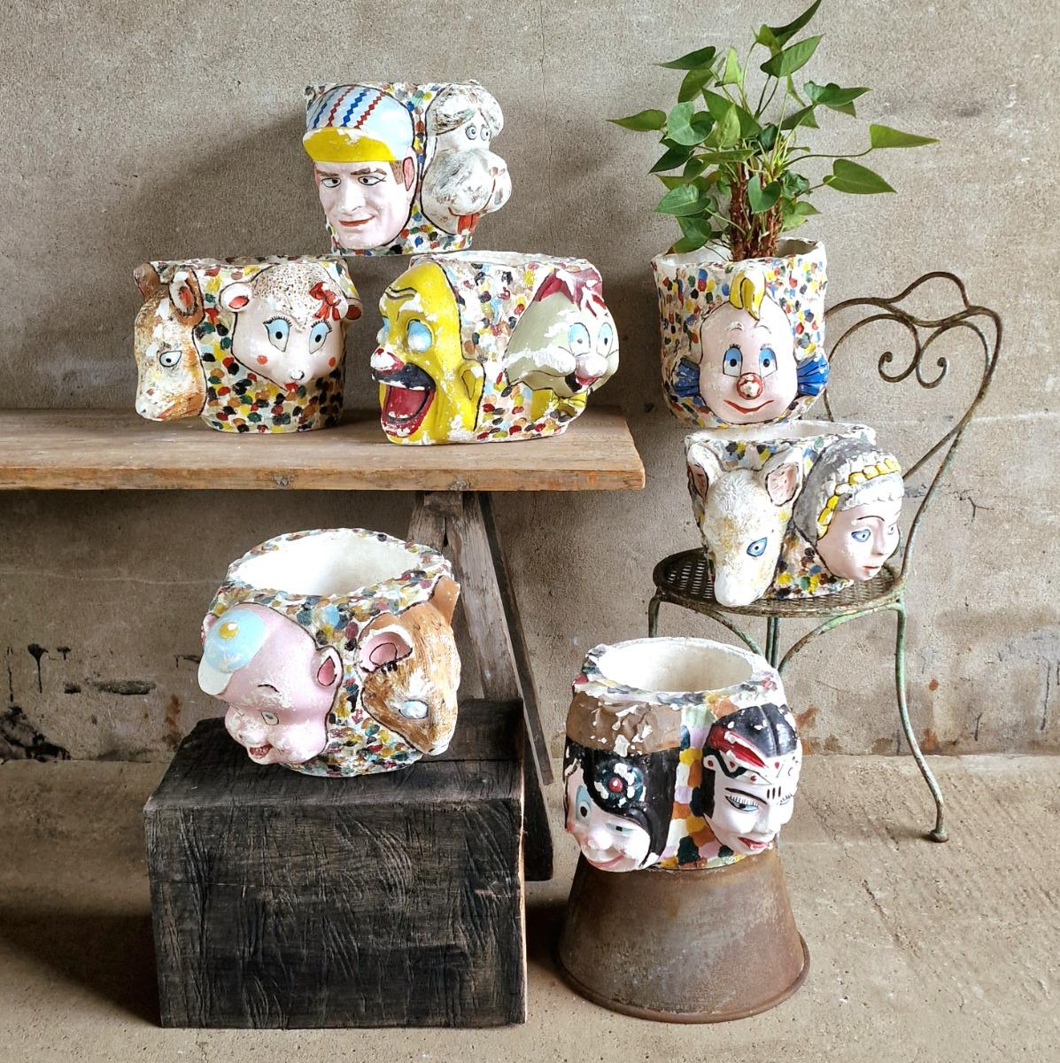 7 painted plaster cache-pots
