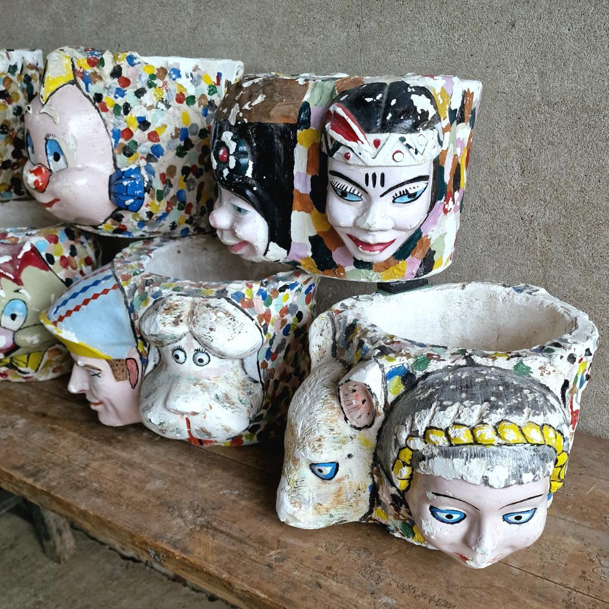7 painted plaster cache-pots