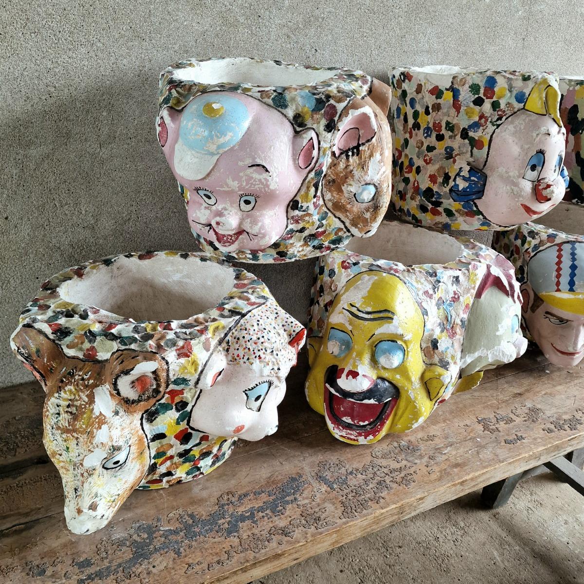 7 painted plaster cache-pots