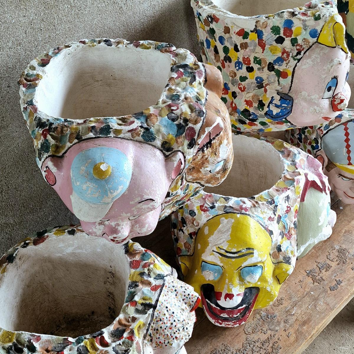 7 painted plaster cache-pots