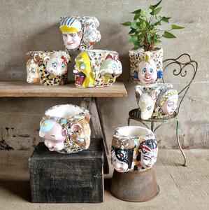7 painted plaster cache-pots