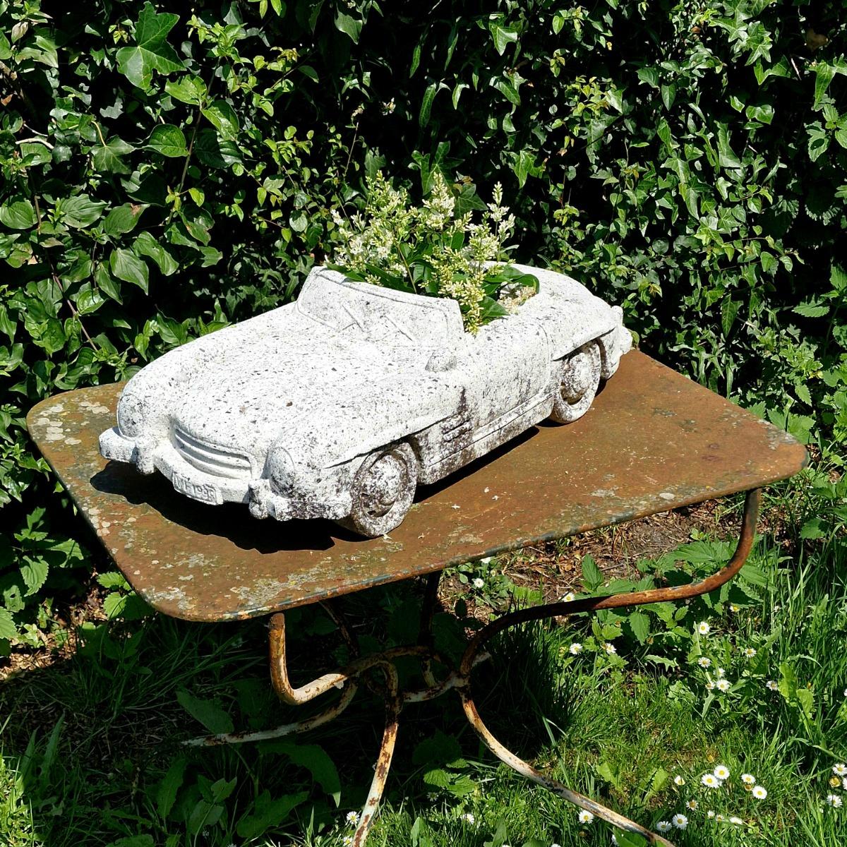 Cast stone car planter