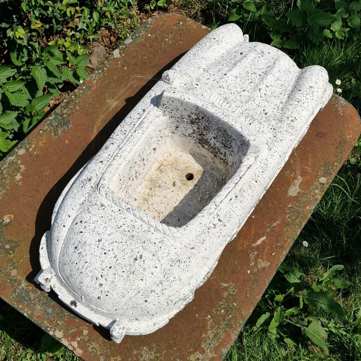 Cast stone car planter