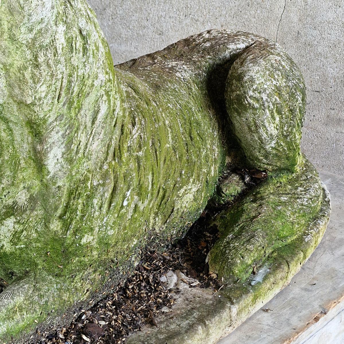 Cast stone dog sculpture