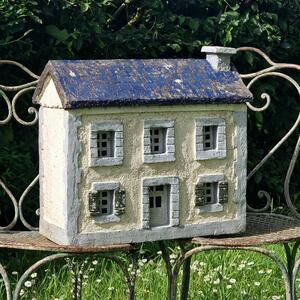 Cast stone house