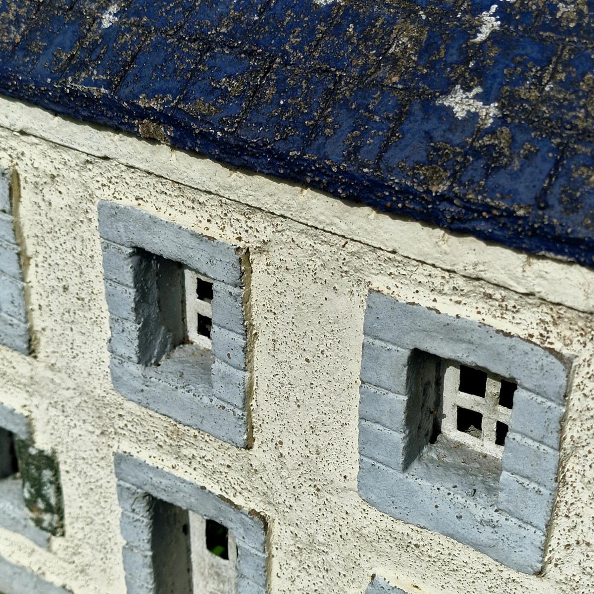 Cast stone house