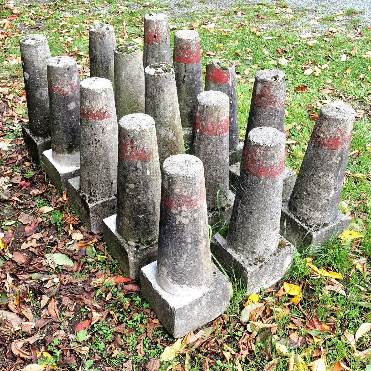 Collection of 15 cast stone land markers