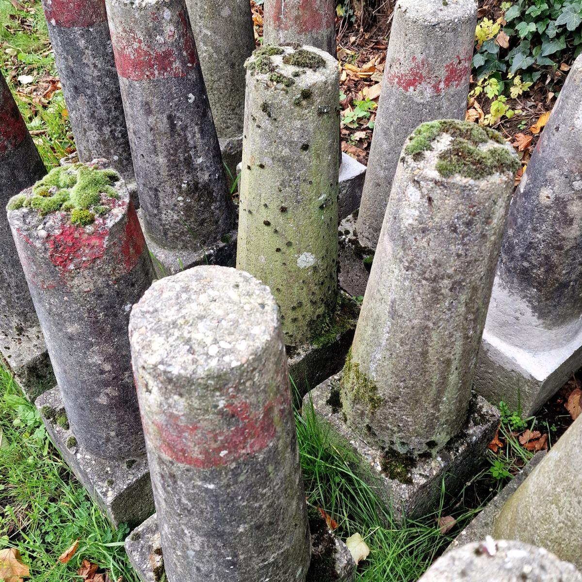 Collection of 15 cast stone land markers