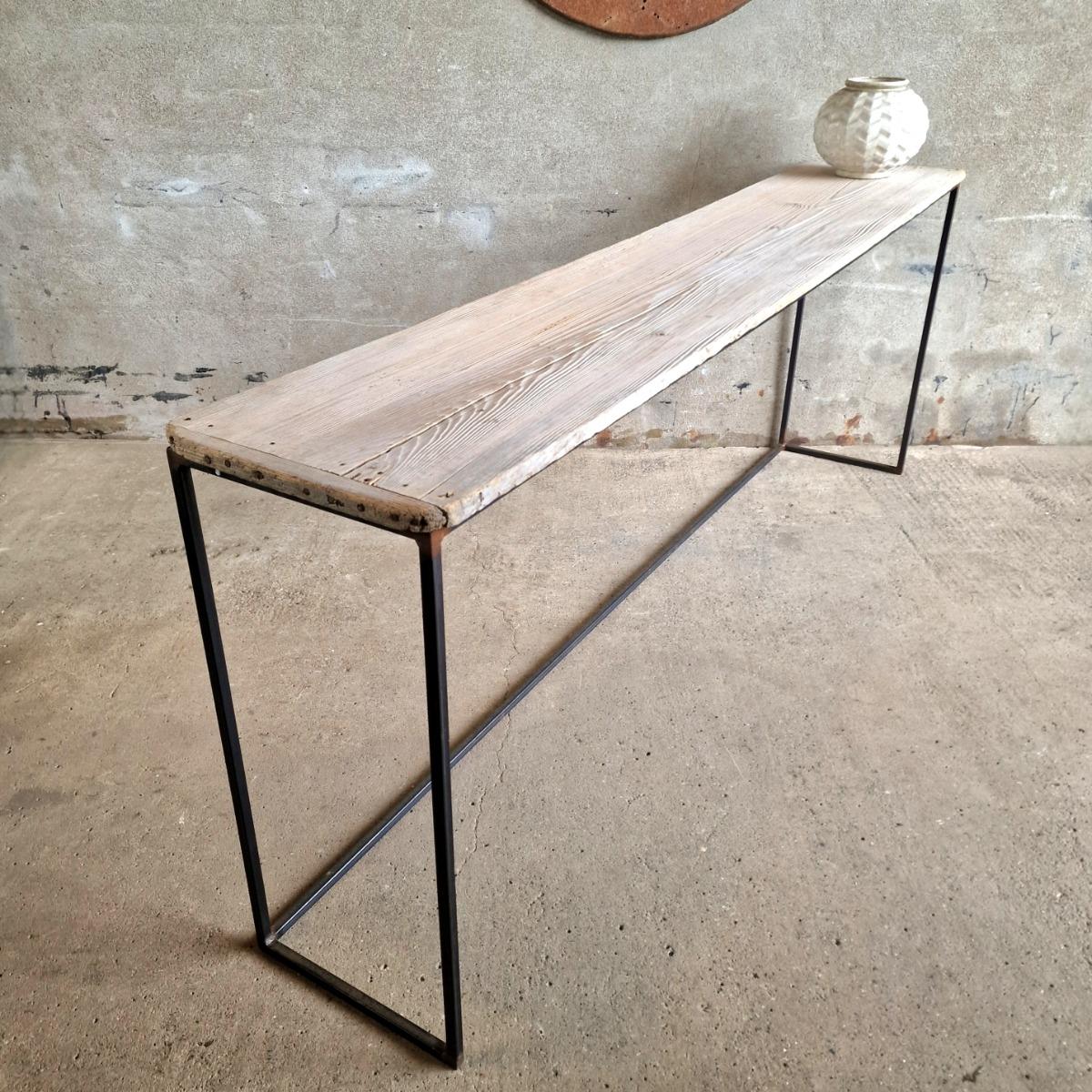 Console table on metal base