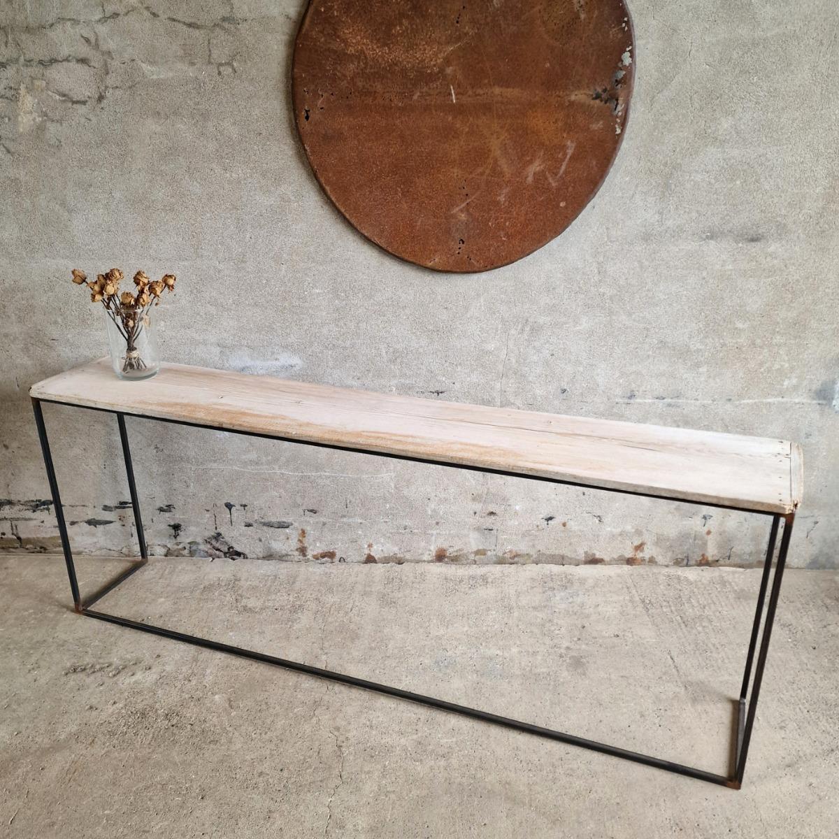 Console table on metal base