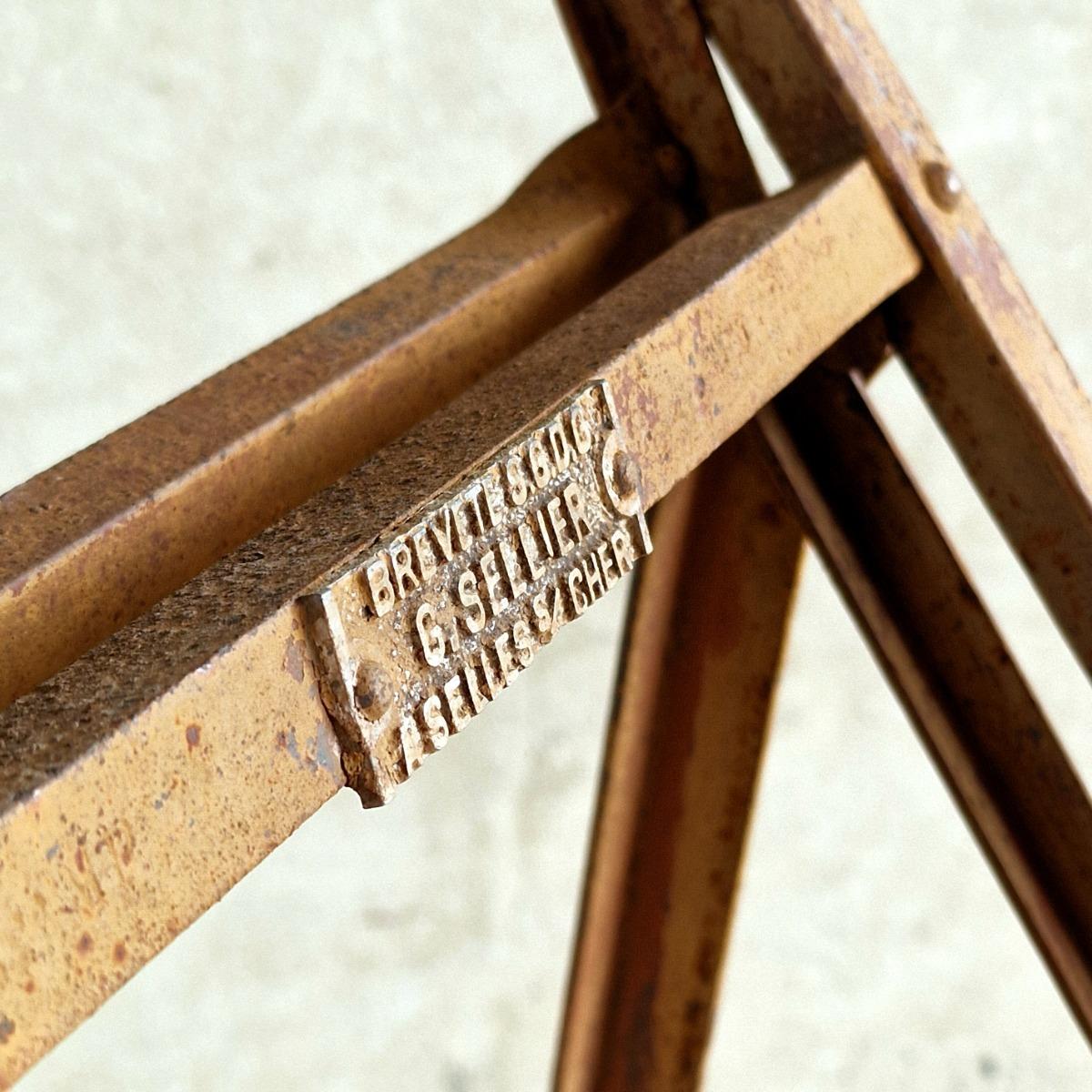 Folding metal ladder