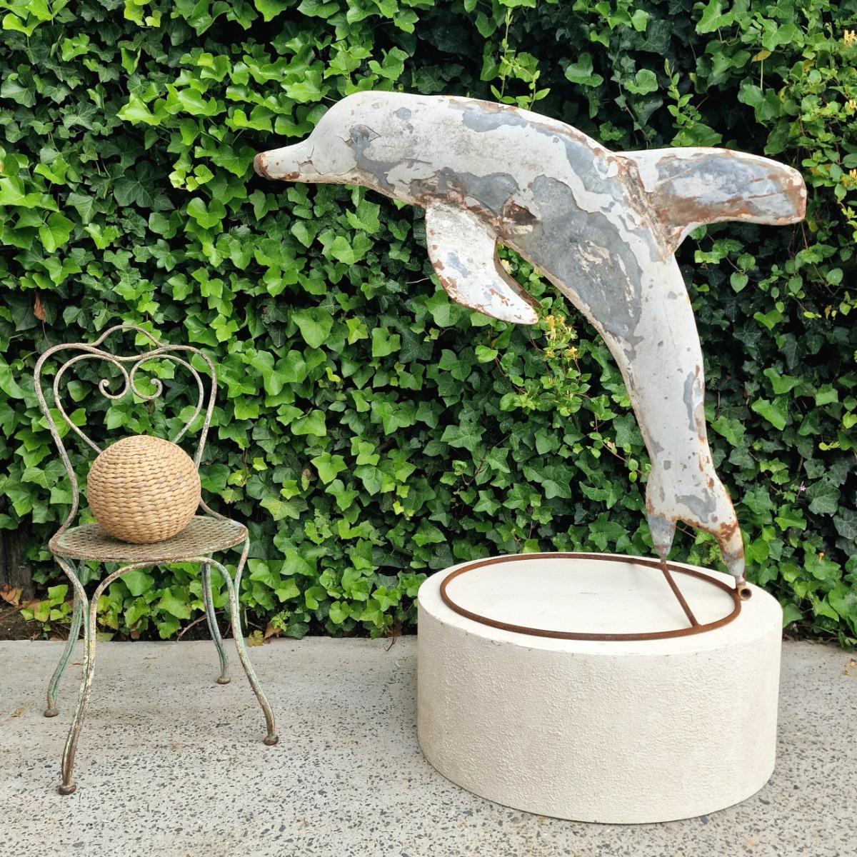 Metal dolphin fountain