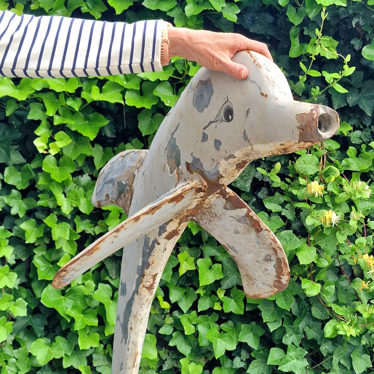 Metal dolphin fountain