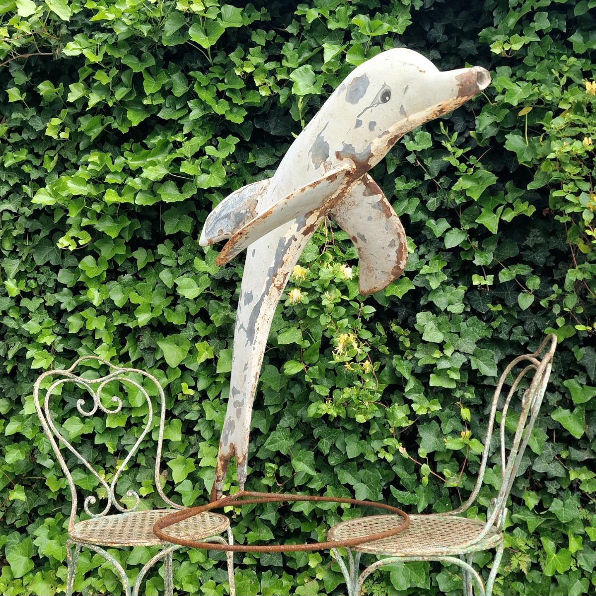 Metal dolphin fountain