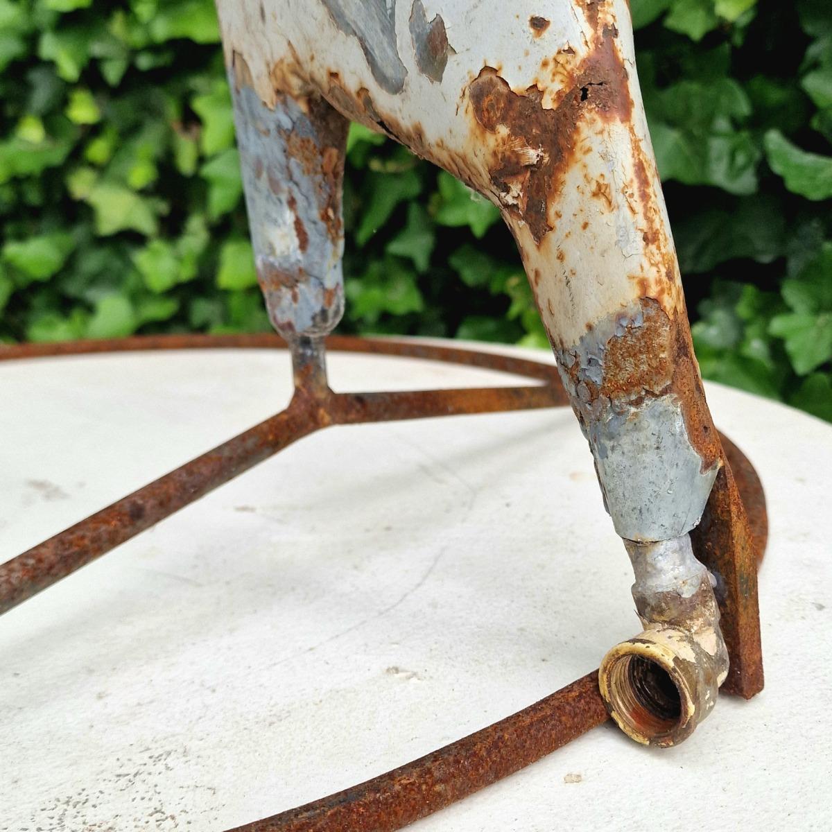 Metal dolphin fountain