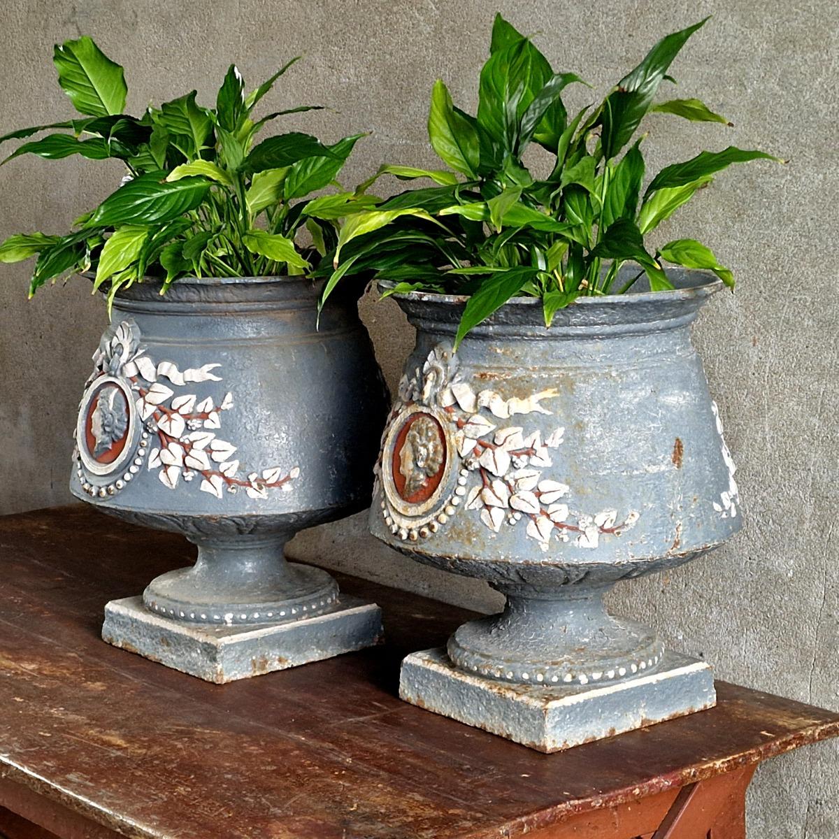 Pair of 19thC painted cast iron urns