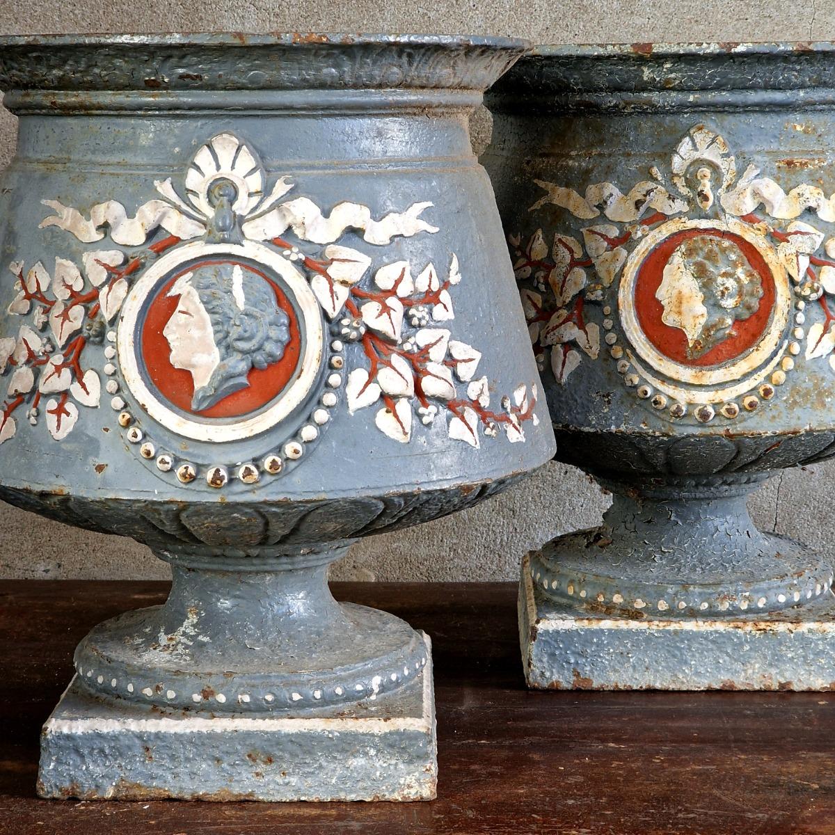 Pair of 19thC painted cast iron urns