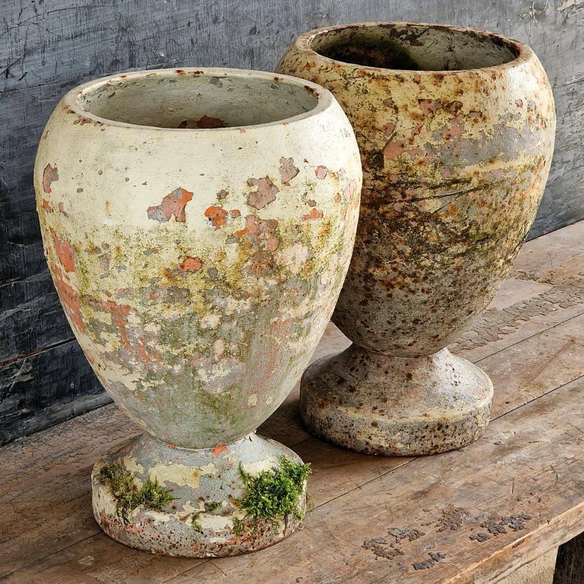 Pair of cast iron urns