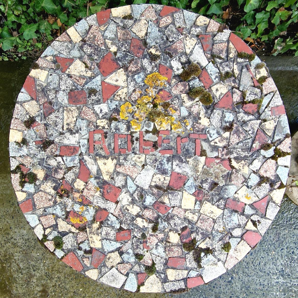 Pair of cast stone mosaic tables