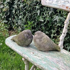 Pair of cast stone pigeons