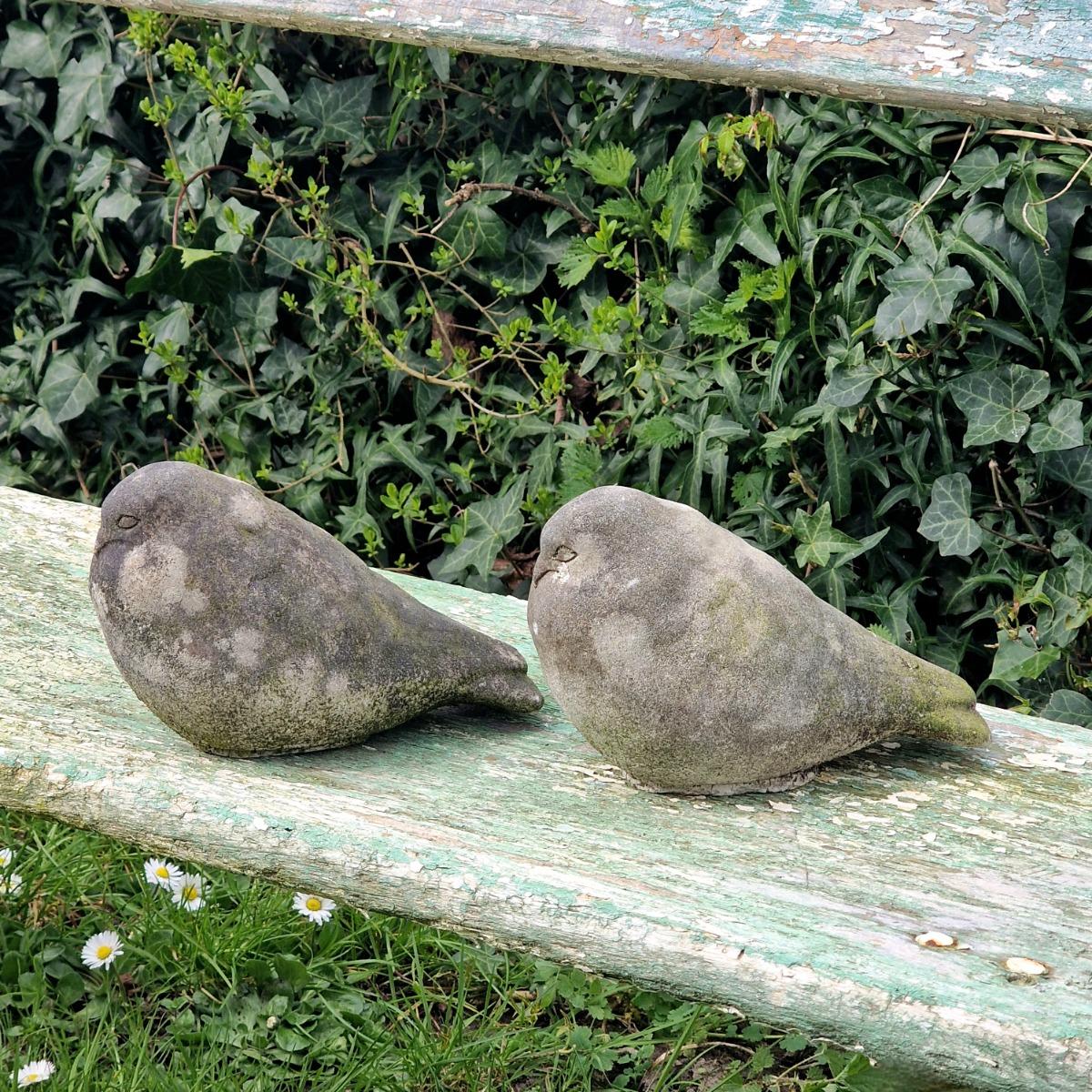 Pair of cast stone pigeons