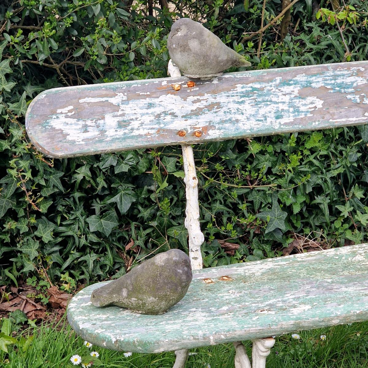 Pair of cast stone pigeons