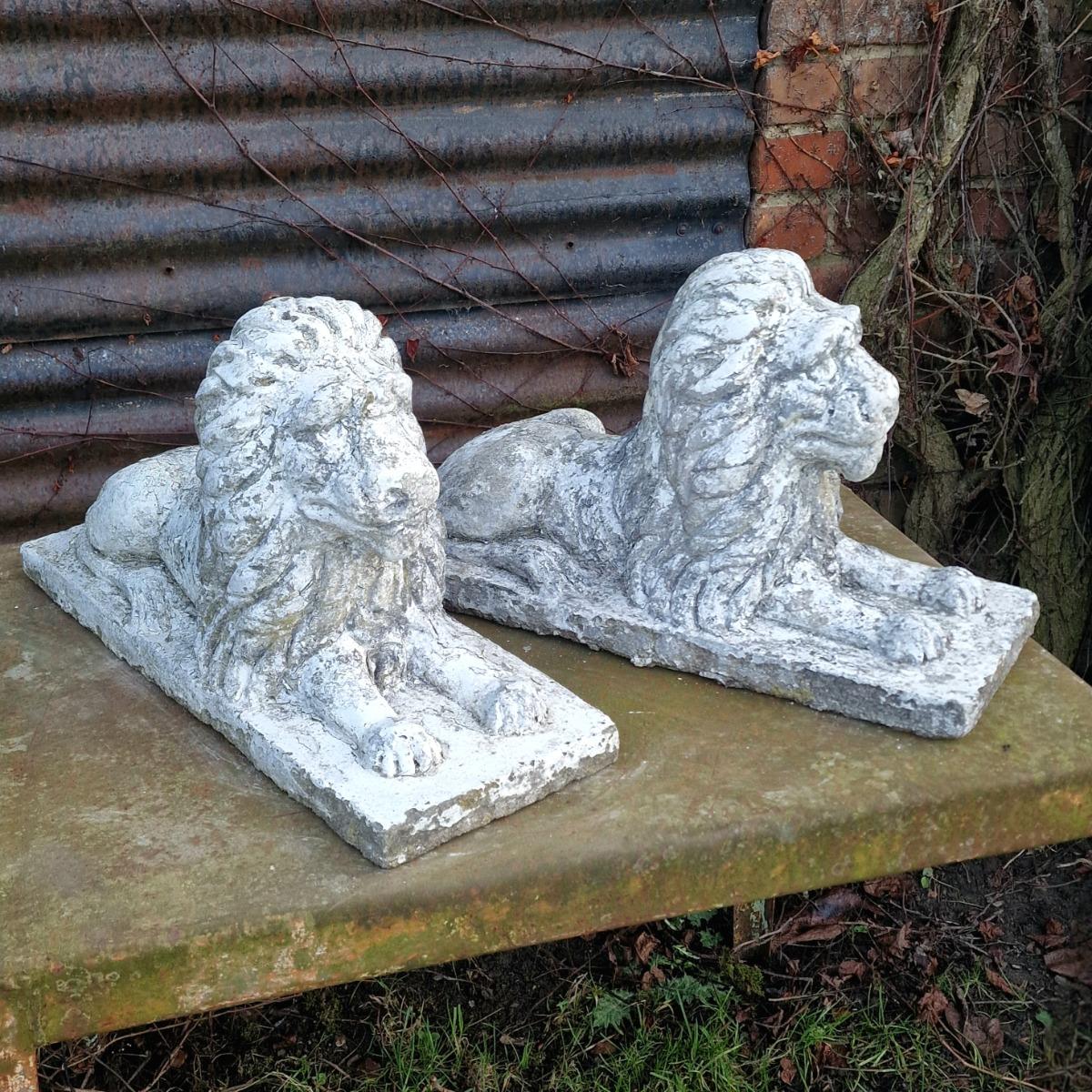 Pair of cute cast stone lions