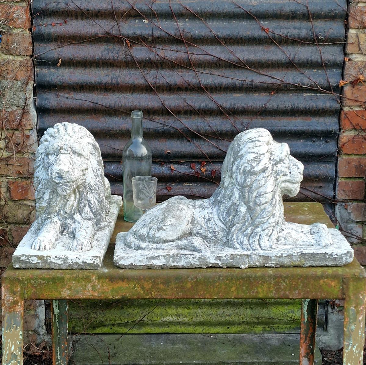Pair of cute cast stone lions