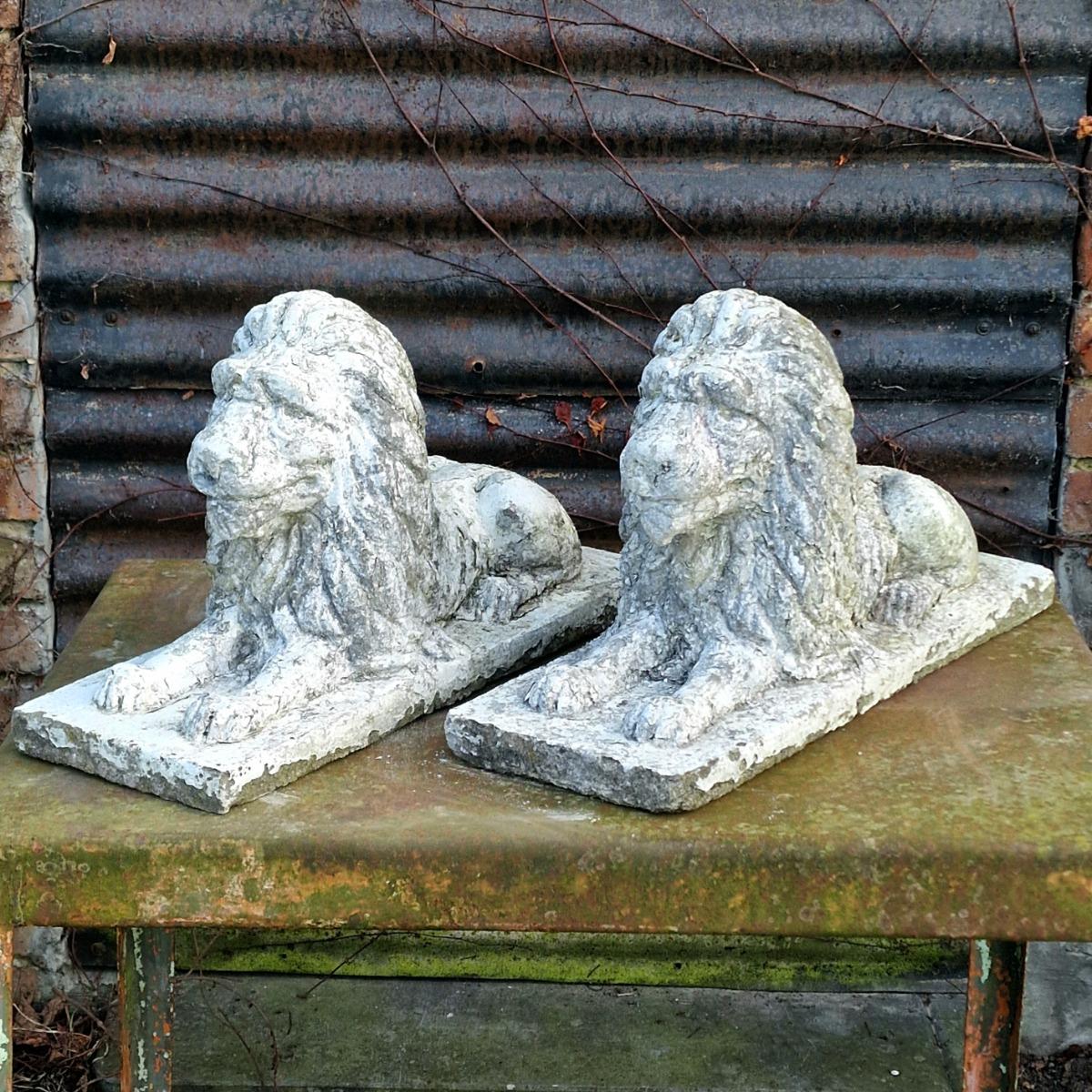 Pair of cute cast stone lions