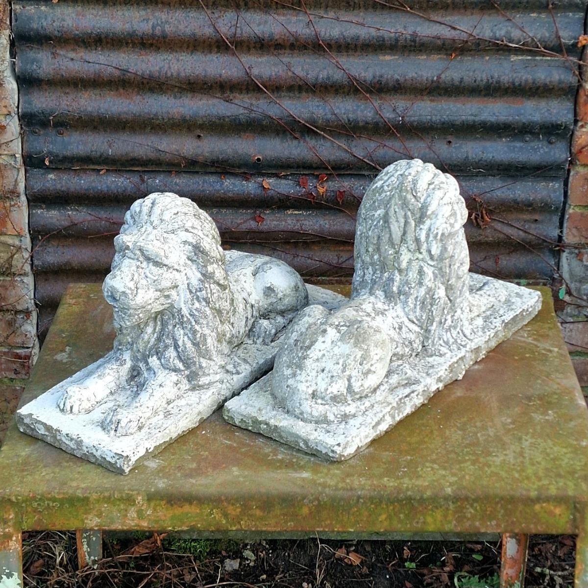 Pair of cute cast stone lions