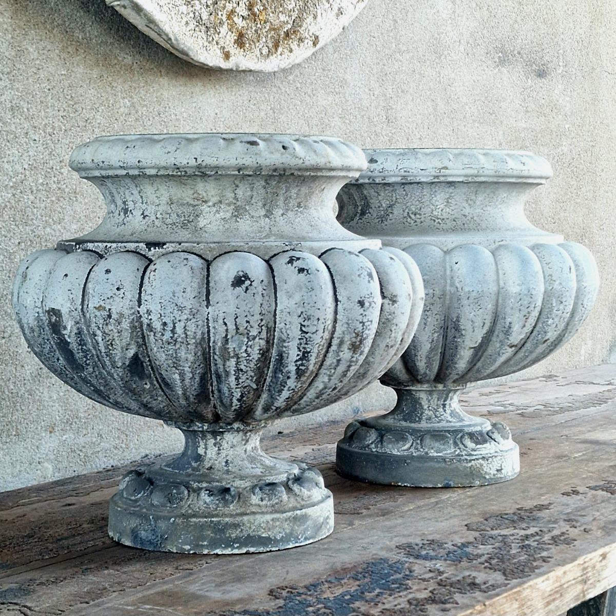 Pair of enameled cast iron planters